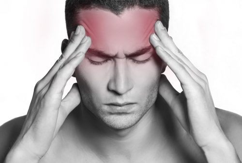 11576036 - handsome man having a migraine isolated on white