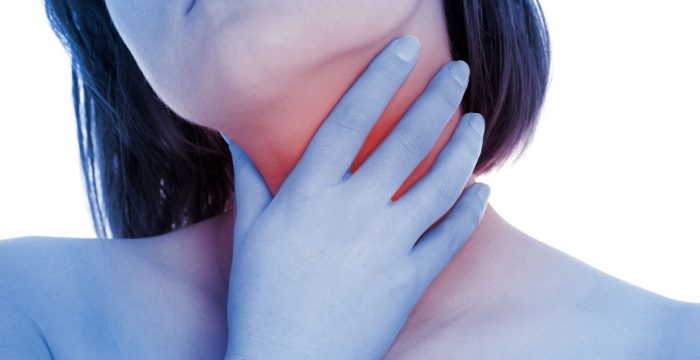 13416642 - a picture of a young woman suffering from tonsillities over white background